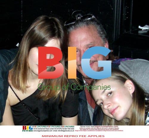 Mickey Rourke and Eugenia kissing at NYC club