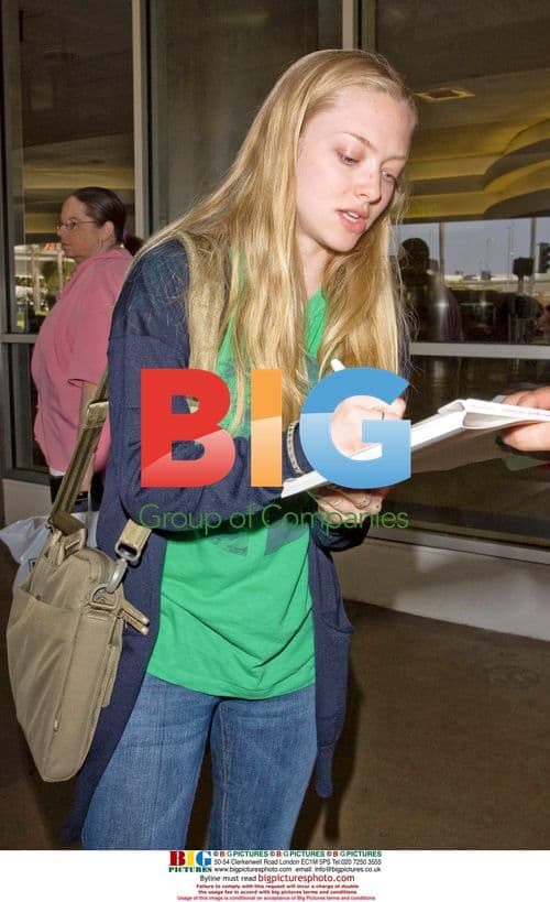 Amanda Seyfried Friendly with Fans at LAX