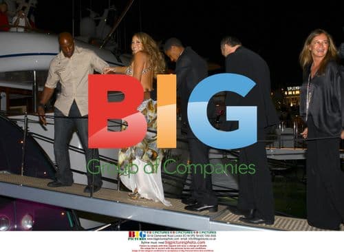 Mariah Carey and Nick Cannon attend Cavalli party