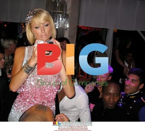 Paris Hilton and Doug Reinhardt at VIP Room Nightclub in Cannes