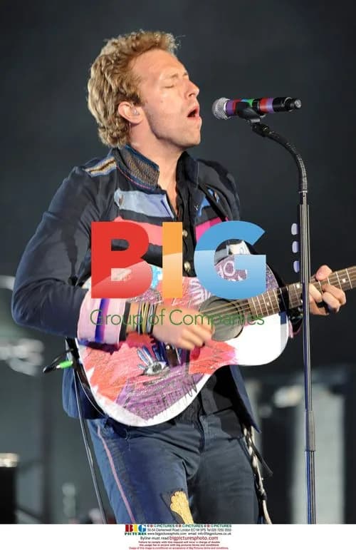 Chris Martin of Coldplay Performs on Tour