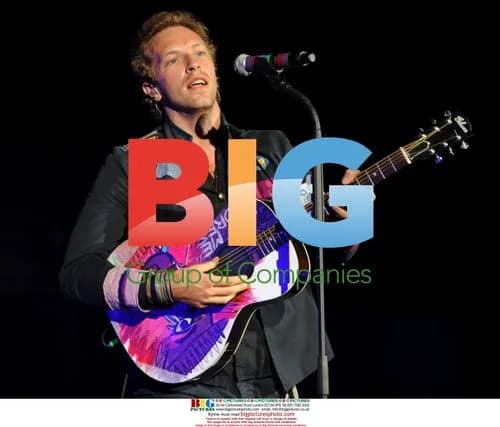 Chris Martin of Coldplay performs on tour
