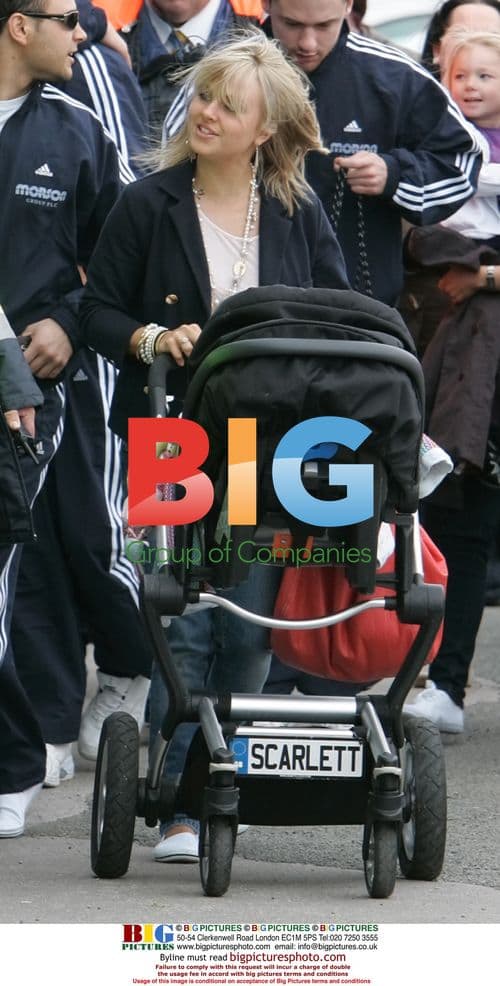 Tina O'Brien and baby Scarlett at soapstar football match