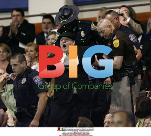 Police remove protester at Obama commencement