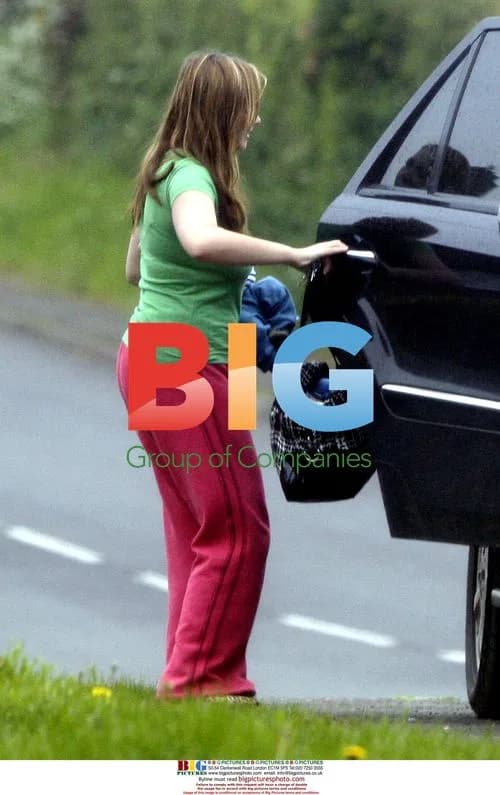 Charlotte Church steps out in rainy weather