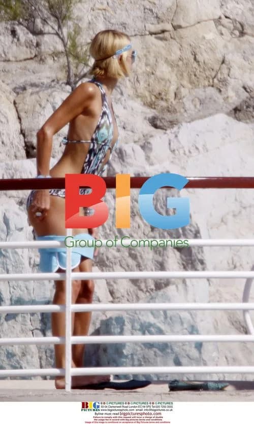 Paris Hilton at Eden Roc pool with boyfriend Doug Reinhardt
