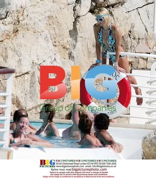 Paris Hilton and boyfriend in pool