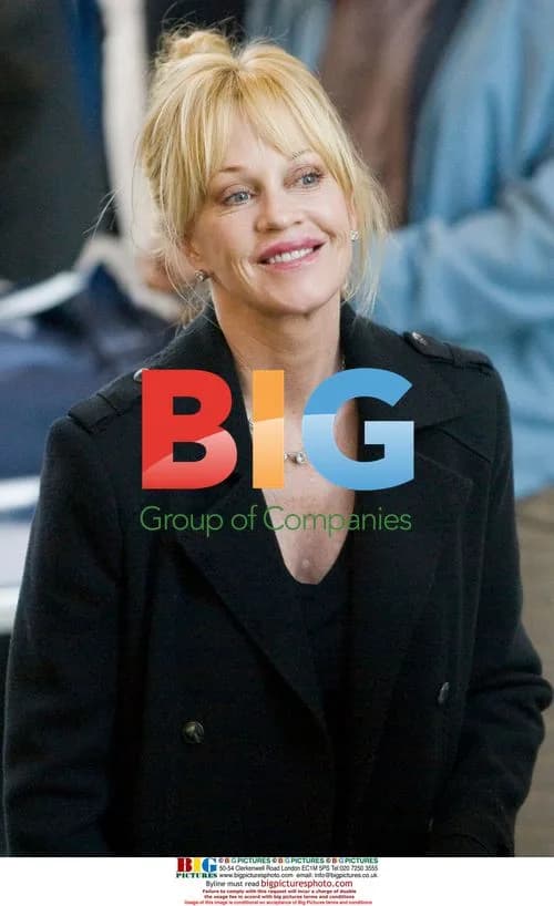 Melanie Griffith Gives Peace Sign at LAX