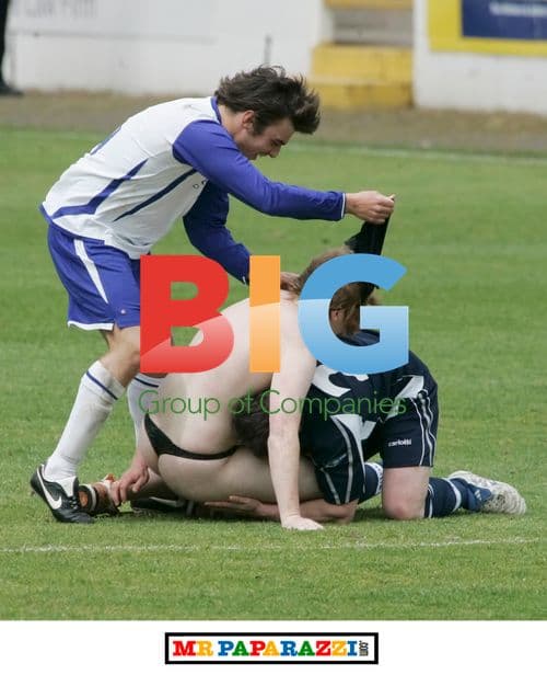 Masked streaker interrupts charity football match