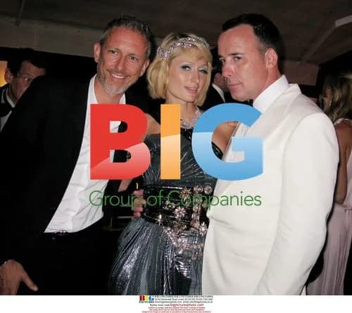 Paris Hilton and David Furnish at AmfAR Cannes Party