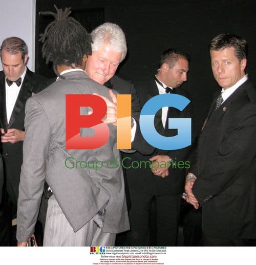 Bill Clinton and Unik at AMFAR 2009 Cannes
