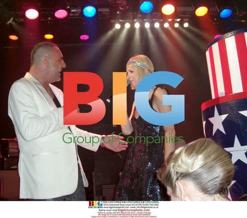 Christian Audigier and Paris Hilton at Fashion Designer Anniversary