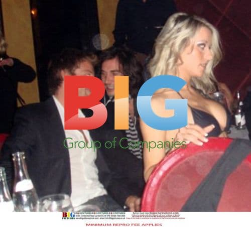 Jenson Button and David Coulthard Celebrate F1 Win