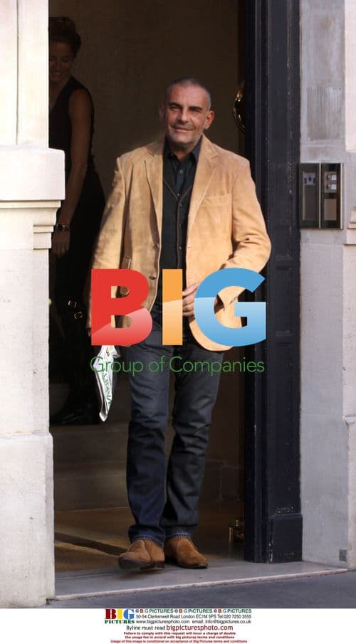 Christian Audigier and Wife in Paris