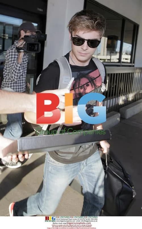 Zac Efron Arriving at LAX