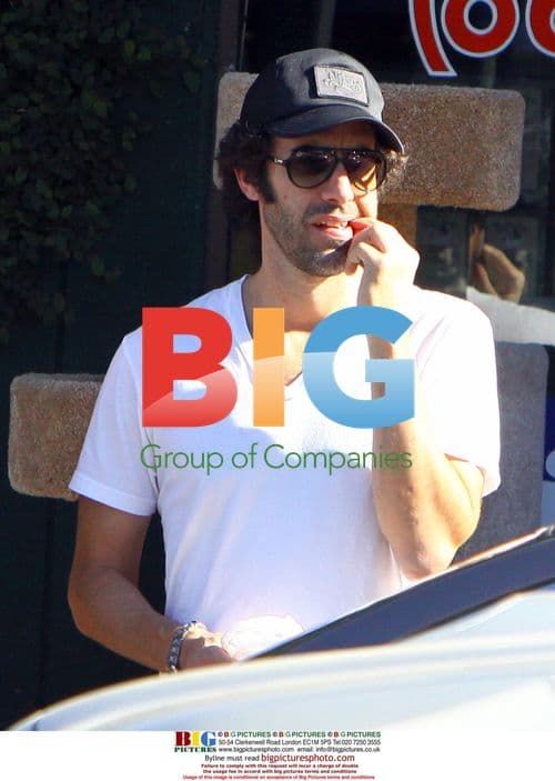 Sacha Baron Cohen picking teeth after lunch
