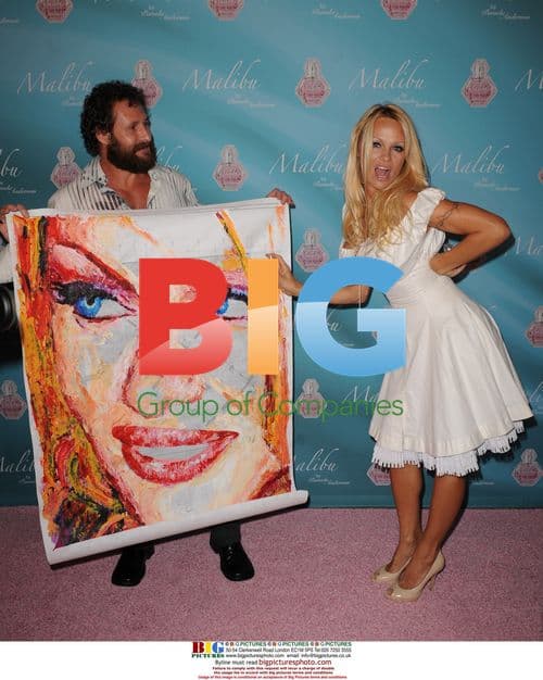 Pamela Anderson Promotes Perfume in Florida