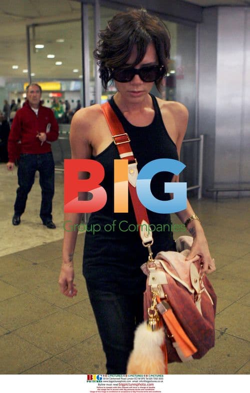 Victoria 'Posh' Beckham at Heathrow Airport