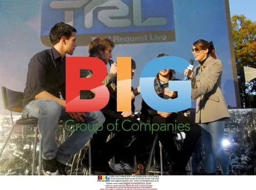 Elisabetta Canalis Hosts 'TRL' with Band Finley in Milan