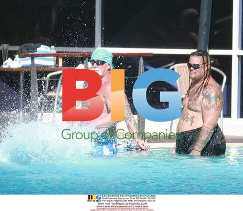 Hulk Hogan relaxes poolside in Australia