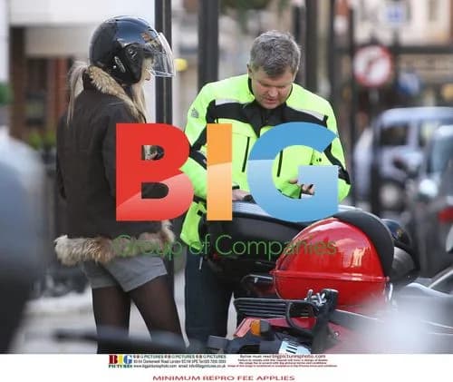 Adrian Chiles with Mystery Blonde