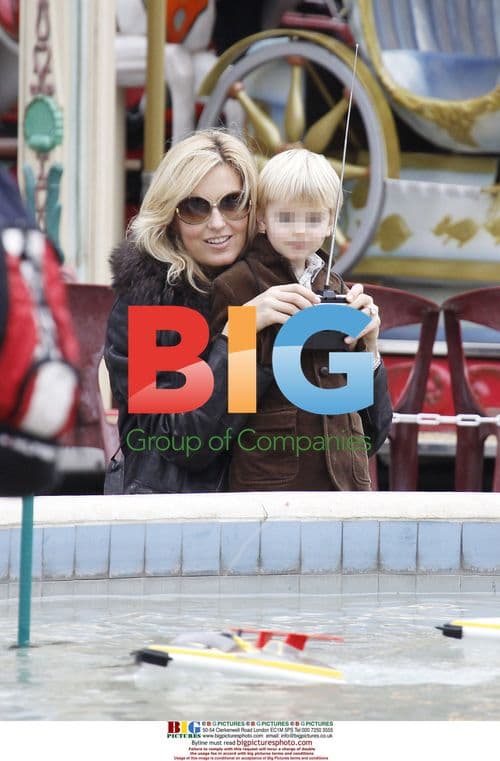 Penny Lancaster and son at Cannes funfair