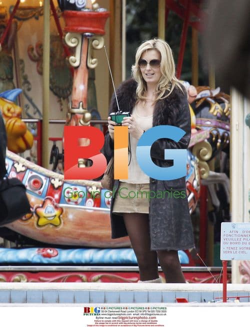Penny Lancaster and son at Cannes funfair