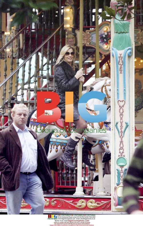 Penny Lancaster and son Alistair at Cannes funfair