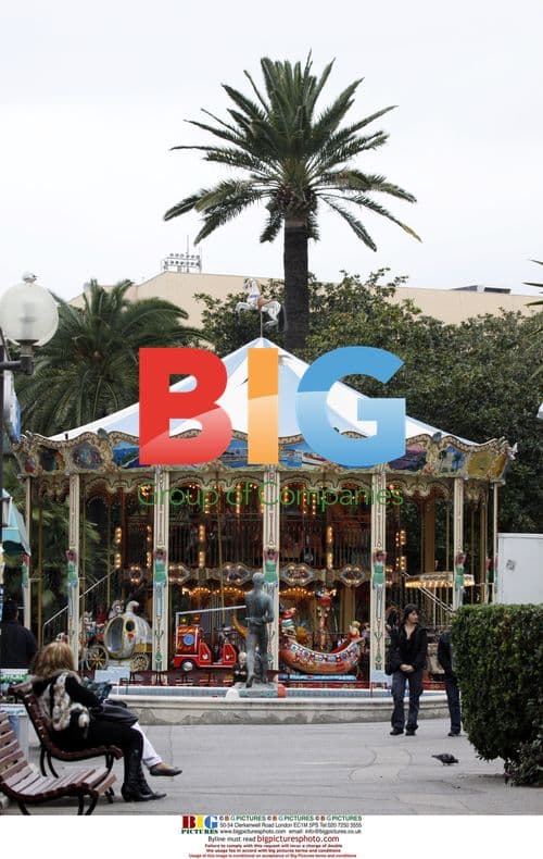 Penny Lancaster and son Alistair at Cannes funfair