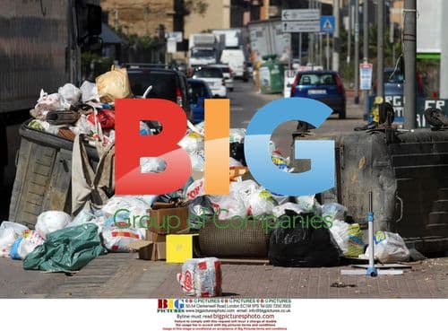 Trash piles up in Palermo, Sicily as garbage collectors strike