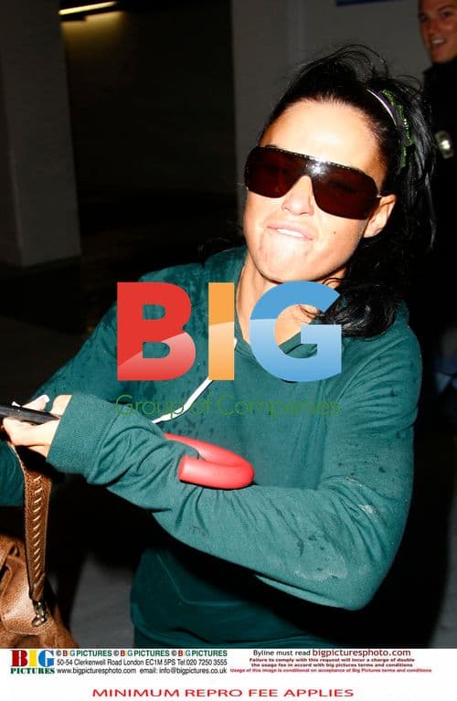 Katie Price loses cool with photographer