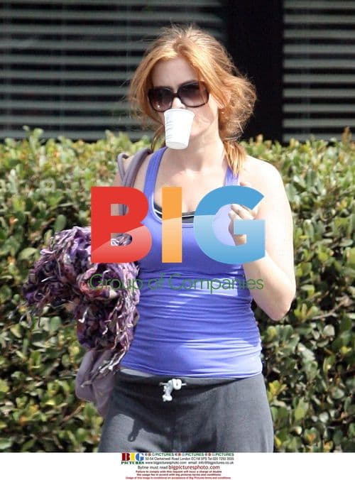 Isla Fisher Hydrating After Workout