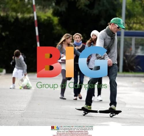 Prince Kyril skateboarding with children