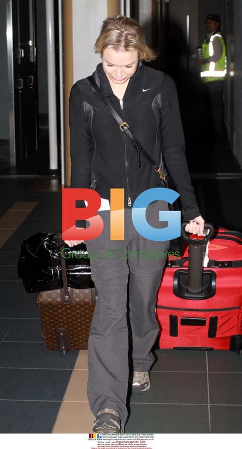 Renee Zellweger and Bradley Cooper at Airport