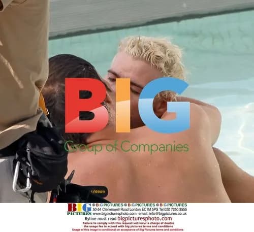 Paul Sculfor films kissing scene in pool