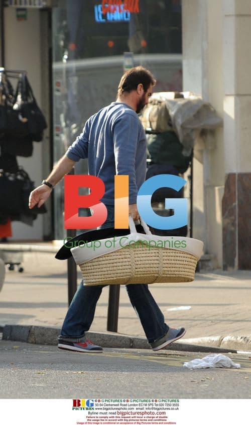 Eric Cantona with wife and newborn son