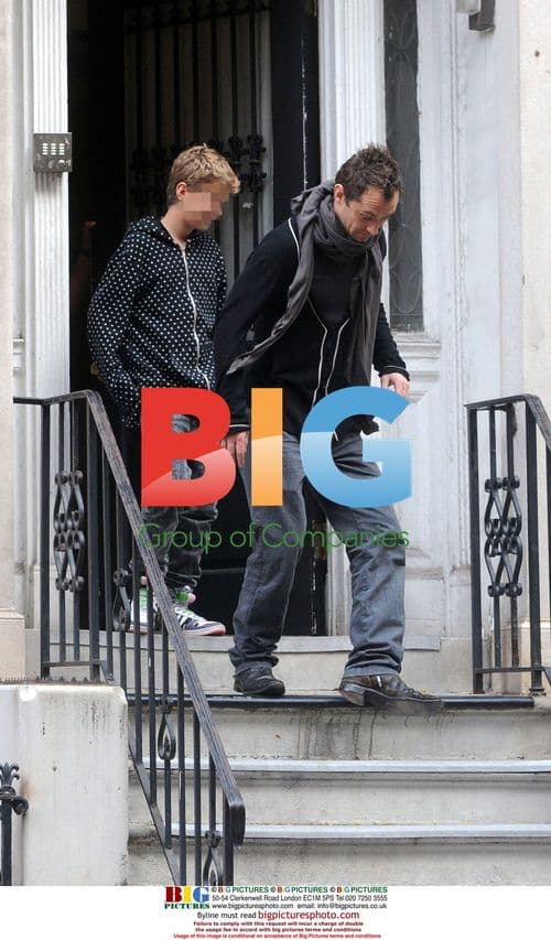 Jude Law and son on sticky steps