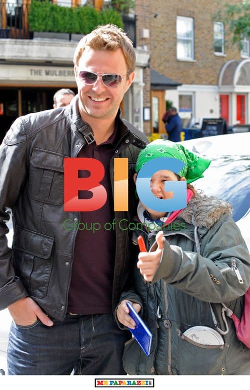 Fan Poses with TV Actor Tom Lister