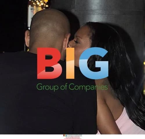 Mel B and Stephen Belafonte kiss at bar