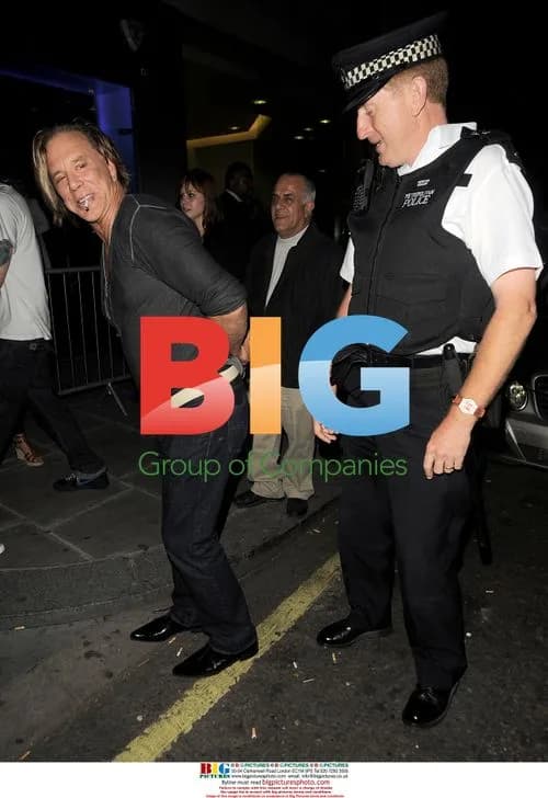 Mickey Rourke Plays With Policeman
