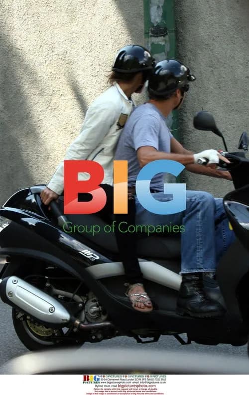 George Clooney Rides Scooter with Girlfriend