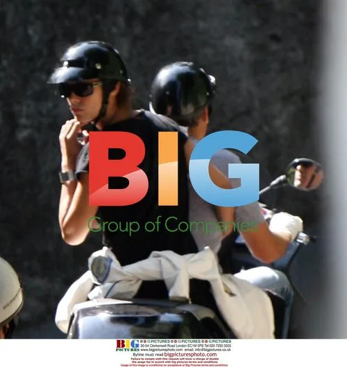 George Clooney Rides Scooter with Girlfriend
