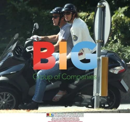 George Clooney Rides Scooter with Girlfriend