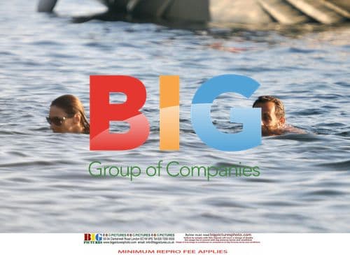 Sarkozy and Bruni Swim at French Estate