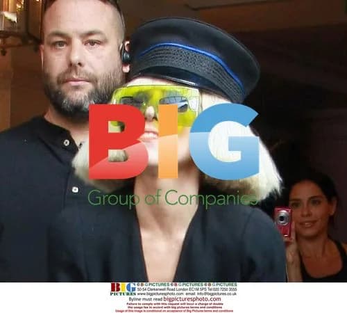 Lady Gaga Leaves Paris Hotel in Unusual Outfit