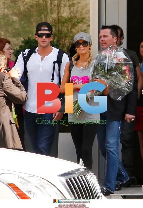Paris Hilton Arrives in Germany with Flowers