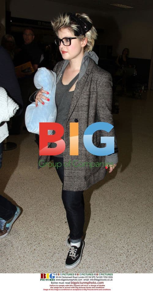 Kelly Osbourne & Louis Van Amstel Arrive at LAX