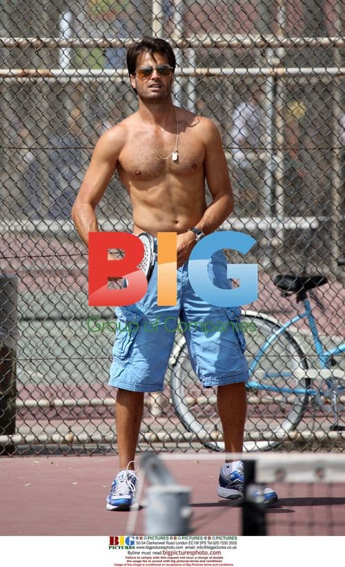 David Charvet plays paddle ball with friends