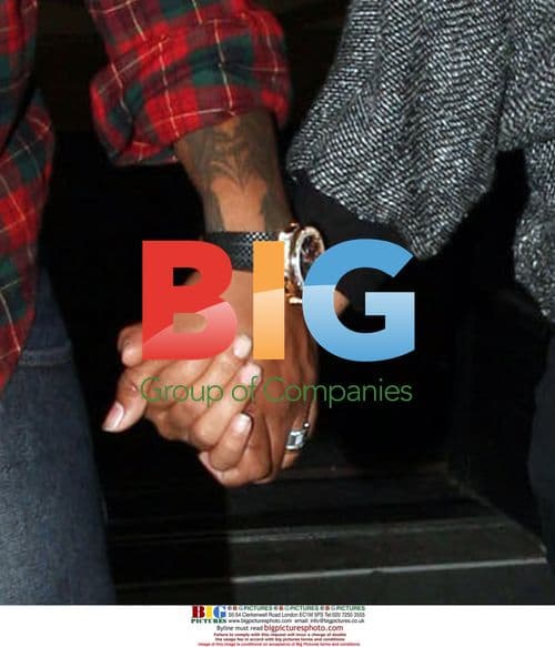 Blissfully happy newlyweds Christina Milian and The-Dream at LAX