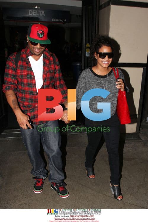 Blissfully happy newlyweds Christina Milian and The-Dream at LAX